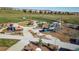 A well-equipped playground with slides and climbing structures, surrounded by community landscaping at 7603 Sabino Ln, Castle Rock, CO 80108