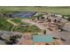 Aerial view of a recreational area with pickleball courts, walking paths, and picnic areas for outdoor activities at 7603 Sabino Ln, Castle Rock, CO 80108