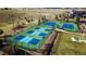 A set of well-maintained tennis courts with blue and green surfaces, perfect for sports enthusiasts at 7603 Sabino Ln, Castle Rock, CO 80108