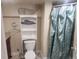 Cozy bathroom with toilet and a whale decoration at 2034 S Lincoln St, Denver, CO 80210