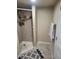 Shower with a tiled surround at 2034 S Lincoln St, Denver, CO 80210