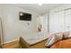 Relaxing bedroom with a view of the staircase to the second floor at 4581 S Garrison St, Littleton, CO 80123