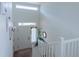 Bright entryway with high ceilings, natural light, and a view of the staircase, creating an open and airy feel at 16382 E 111Th Dr, Commerce City, CO 80022