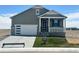 Charming single-Gathering home with a well-manicured lawn, covered entry, and an attached two-car garage at 42982 Colonial Trl, Elizabeth, CO 80107