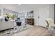 Cozy living room with natural light, stylish furnishings, and access to outdoor views at 4 Meadowlark Ln, Littleton, CO 80123