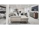 Open-concept living space features modern furniture and plenty of room for entertaining and gathering at 4 Meadowlark Ln, Littleton, CO 80123