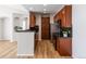 Well-equipped kitchen with stainless steel appliances and dark countertops, adjoining the open concept living room at 1574 Olympia Cir # 305, Castle Rock, CO 80104