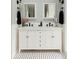 Double vanity featuring marble countertop, dual sinks, and modern fixtures at 3410 W 31St Ave, Denver, CO 80211