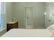 Bedroom with a view of the bathroom, and a window with natural light at 3410 W 31St Ave, Denver, CO 80211