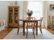 Dining room featuring a round table, seating for four, and a bright window with natural light at 3410 W 31St Ave, Denver, CO 80211