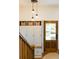 Entryway mud room featuring built-in storage with lighting and a hardwood door with glass at 3410 W 31St Ave, Denver, CO 80211