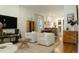 Open concept living room and kitchen with hardwood floors and contemporary decor at 3410 W 31St Ave, Denver, CO 80211