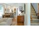 Living room open to dining area featuring stylish hardwood floors and neutral paint at 3410 W 31St Ave, Denver, CO 80211