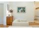 Living room featuring hardwood floors, neutral furniture, and accent artwork at 3410 W 31St Ave, Denver, CO 80211