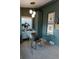 Stylish office with a glass desk, lots of storage, and natural light at 3410 W 31St Ave, Denver, CO 80211