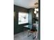 Stylish office with a glass desk, lots of storage, and natural light at 3410 W 31St Ave, Denver, CO 80211