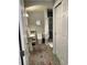 Cozy bathroom featuring a pedestal sink, toilet, shower and stylish decorative rug at 10535 Cottoneaster Way, Parker, CO 80134