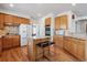 Well-equipped kitchen with an island and modern appliances at 10535 Cottoneaster Way, Parker, CO 80134