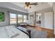 Spacious main bedroom with hardwood floors and lots of natural light at 10535 Cottoneaster Way, Parker, CO 80134