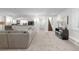 Finished basement features an open layout, wet bar, and stairs to the upper level at 579 Madison St, Denver, CO 80206