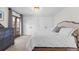Main bedroom features light carpet, white walls, and white closets at 579 Madison St, Denver, CO 80206