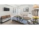 Cozy bedroom with soft lighting, comfortable bed, and stylish decor at 579 Madison St, Denver, CO 80206