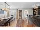 Elegant dining room with wooden table, bench seating, and a modern chandelier at 579 Madison St, Denver, CO 80206