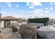 Rooftop deck featuring comfortable seating and privacy hedge at 579 Madison St, Denver, CO 80206