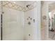 Modern shower with glass doors, multiple shower heads, and a clean, tiled design at 579 Madison St, Denver, CO 80206