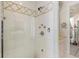 Contemporary glass shower has several shower heads and tile surround at 579 Madison St, Denver, CO 80206