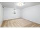 Minimalist bedroom with neutral carpet and paint, offering a blank canvas for new owners at 7120 S Sheridan Ct, Littleton, CO 80128