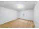 Bright, carpeted bedroom with a small window and neutral paint, perfect for personalization at 7120 S Sheridan Ct, Littleton, CO 80128