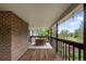 Covered outdoor deck featuring a wooden table with seating at 5292 W Fair Dr, Littleton, CO 80123