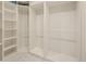 Spacious walk-in closet with built-in shelving and ample storage space at 5292 W Fair Dr, Littleton, CO 80123
