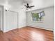 Inviting bedroom with hardwood floors, double closets, and a bright window at 591 Nome St, Aurora, CO 80010