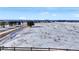 View of neighborhood with snow covered fields and homes at 1607 Rosedale St, Castle Rock, CO 80104