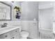 Updated bathroom with subway tile, modern vanity, and stylish decor at 1607 Rosedale St, Castle Rock, CO 80104