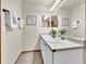 Double vanity bathroom with large mirror at 1607 Rosedale St, Castle Rock, CO 80104