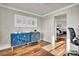 Home office with hardwood floors and built-in cabinet at 1607 Rosedale St, Castle Rock, CO 80104