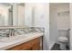 Updated bathroom featuring tiled shower, modern fixtures, and vanity at 888 N Logan St # 2E, Denver, CO 80203