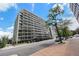 High-rise building with balconies on each floor, offering stunning views and outdoor living spaces for residents at 888 N Logan St # 2E, Denver, CO 80203