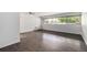Bright living room with large window and hardwood floors at 888 N Logan St # 2E, Denver, CO 80203