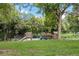 Community playground nestled in a leafy park, offering a safe and fun area for children at 888 N Logan St # 2E, Denver, CO 80203