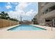 Inviting swimming pool surrounded by lounge chairs offering a comfortable outdoor experience for residents at 888 N Logan St # 2E, Denver, CO 80203