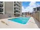 Outdoor swimming pool with lounge chairs, providing a relaxing and inviting space for residents at 888 N Logan St # 2E, Denver, CO 80203