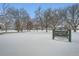 Park entrance sign, snow covered ground, winter scene at 1825 Kendall St # 101, Lakewood, CO 80214