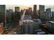 An expansive Denver cityscape view shows skyscrapers against a sunlit sky, highlighting the city's vibrant urban landscape at 1827 N Grant St # 1000, Denver, CO 80203