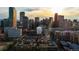 Denver's cityscape features towering skyscrapers under a bright sun, showcasing urban density and architectural diversity at 1827 N Grant St # 1000, Denver, CO 80203