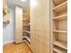 Organized walk-in closet with custom shelving and storage solutions at 1827 N Grant St # 1000, Denver, CO 80203