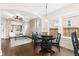 Cozy dining area connects to a living room featuring great natural light at 3649 N Garfield St, Denver, CO 80205